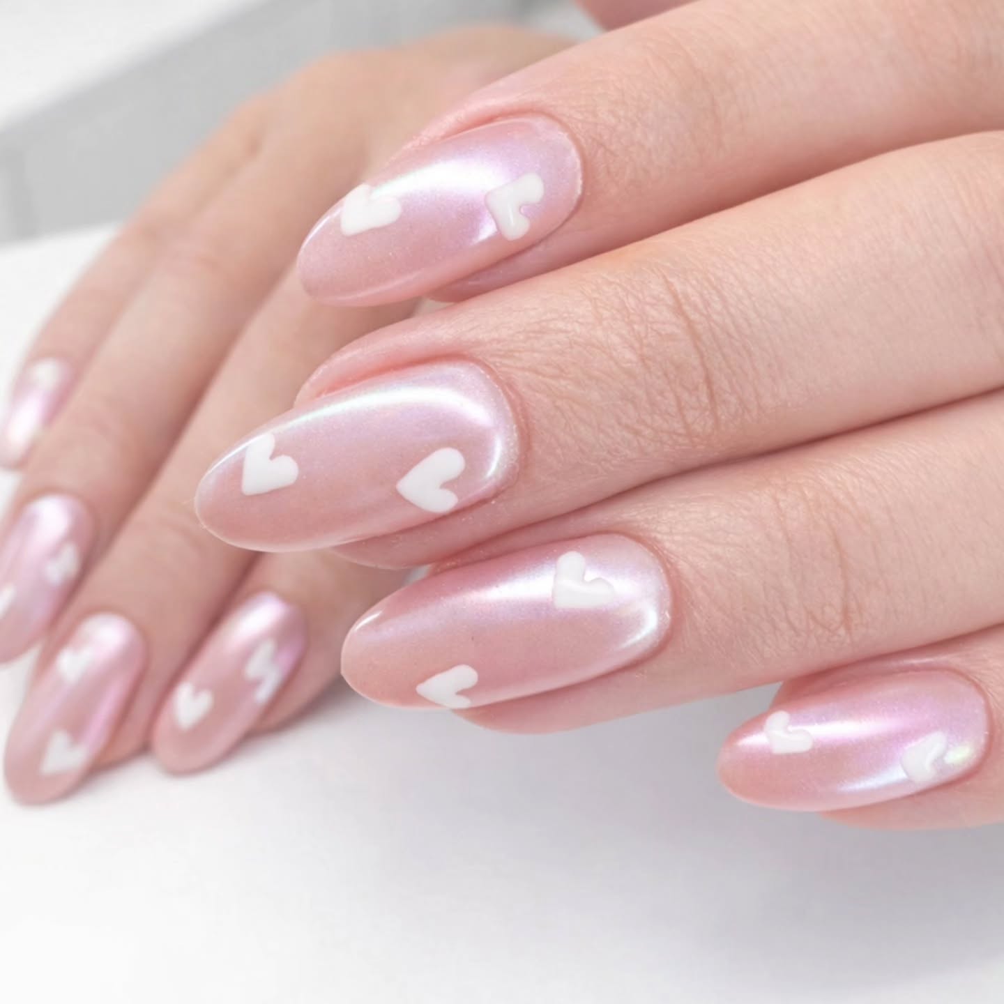 Glazed pink perfection finished with delicate white hearts… subtle, romantic and totally obsessed